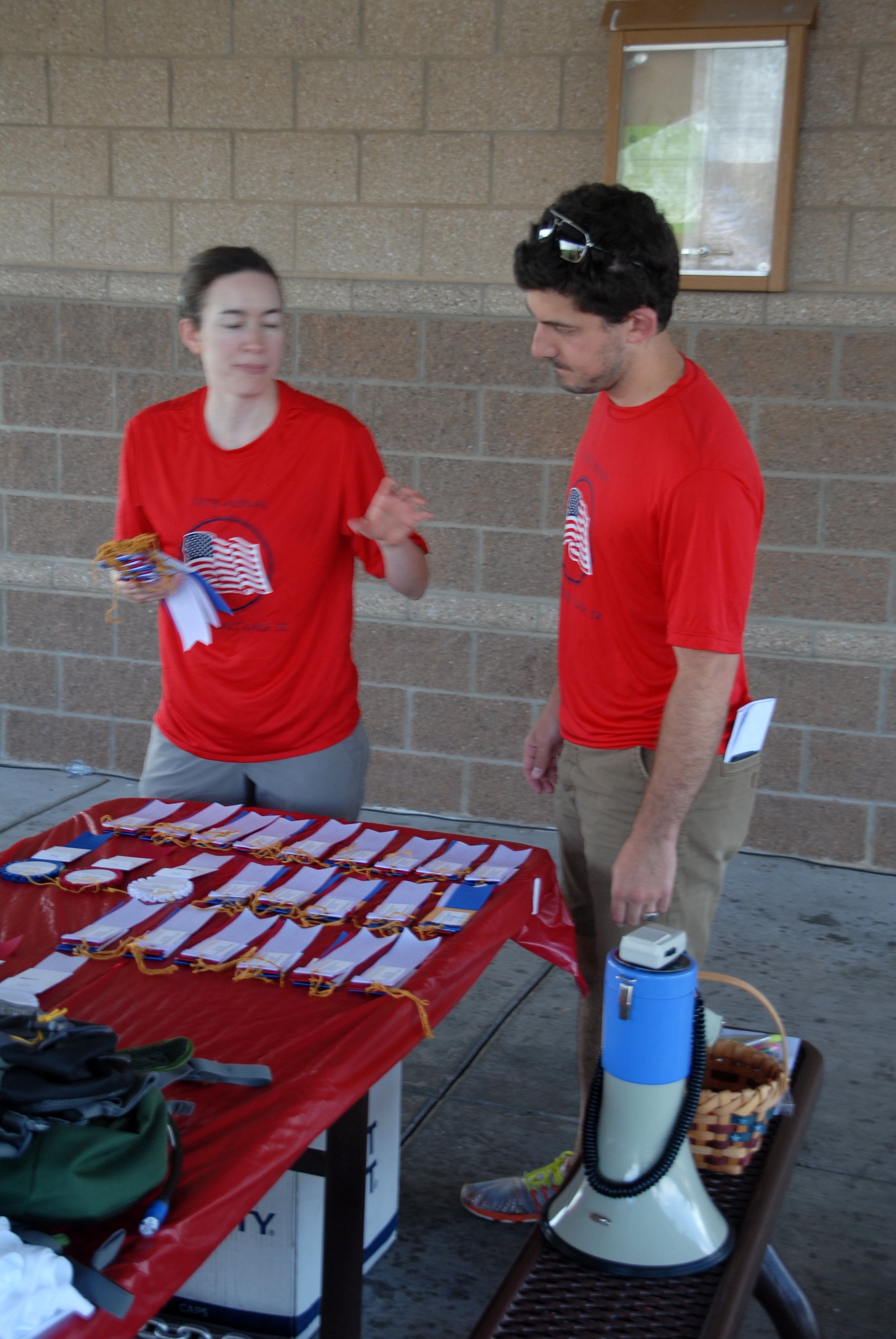Lori and Tayler Setting Up the Awards Table